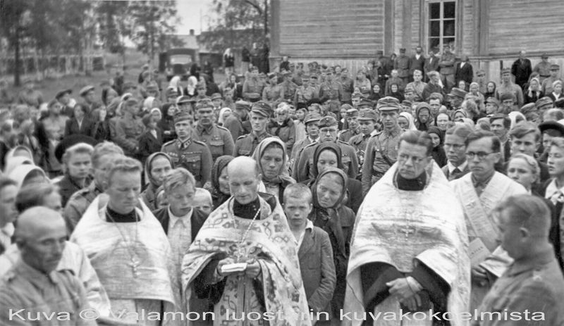 Tiedosto:Hautajaiset siella jossakin val.jpg